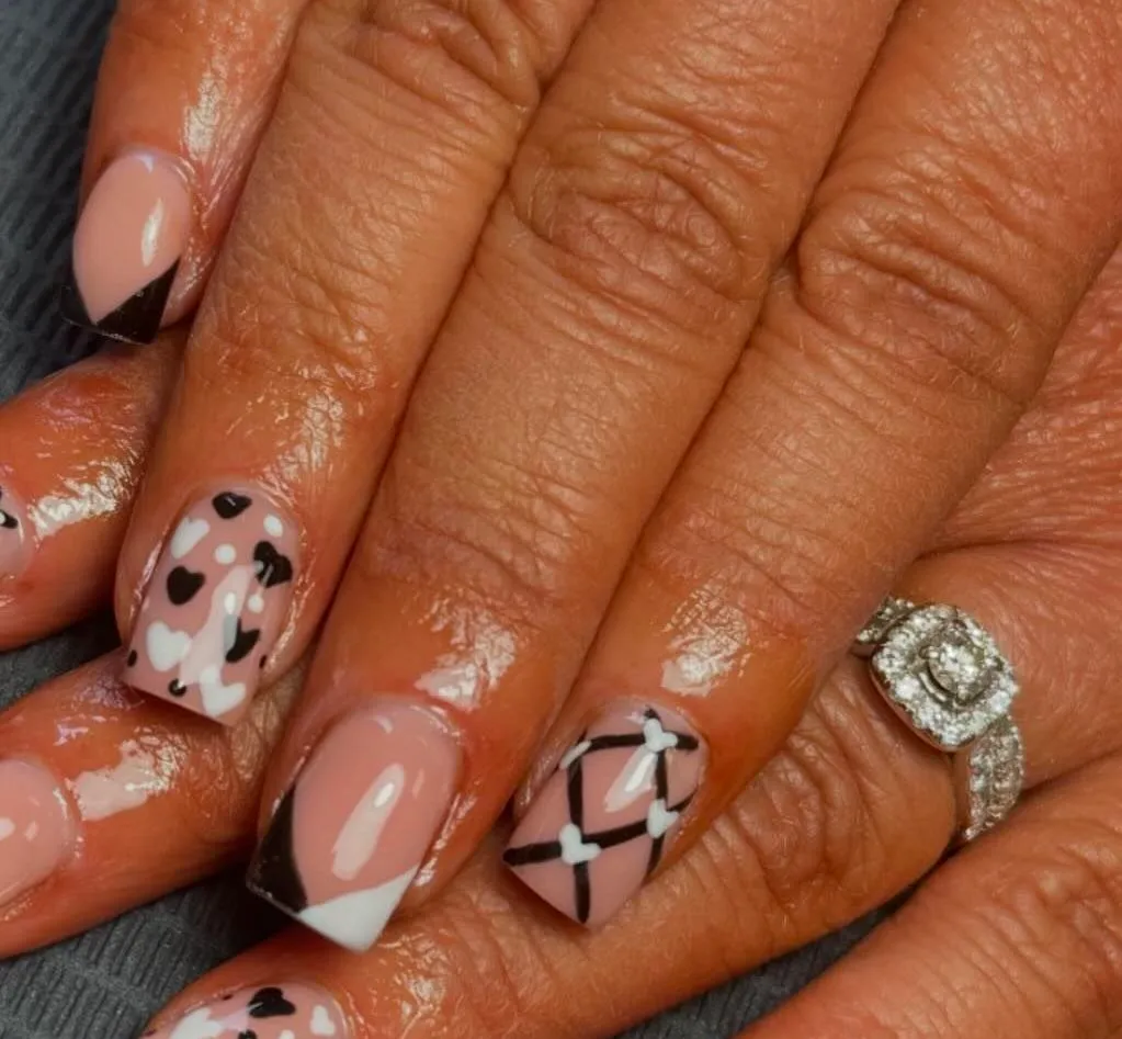Client with detailed nail art by Jodie Leslie.