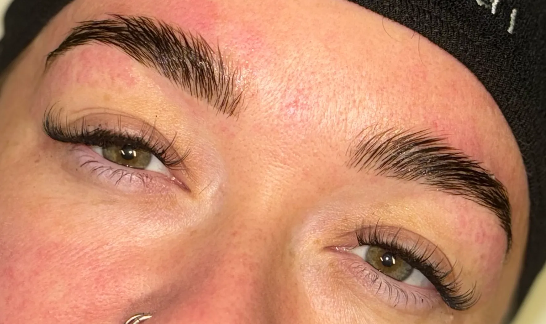 Customer eyebrows after wax, lamination and tint