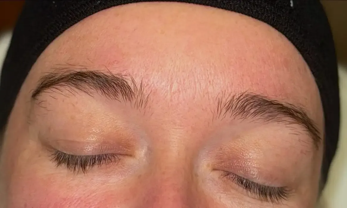 Customer eyebrows before wax, lamination and tint